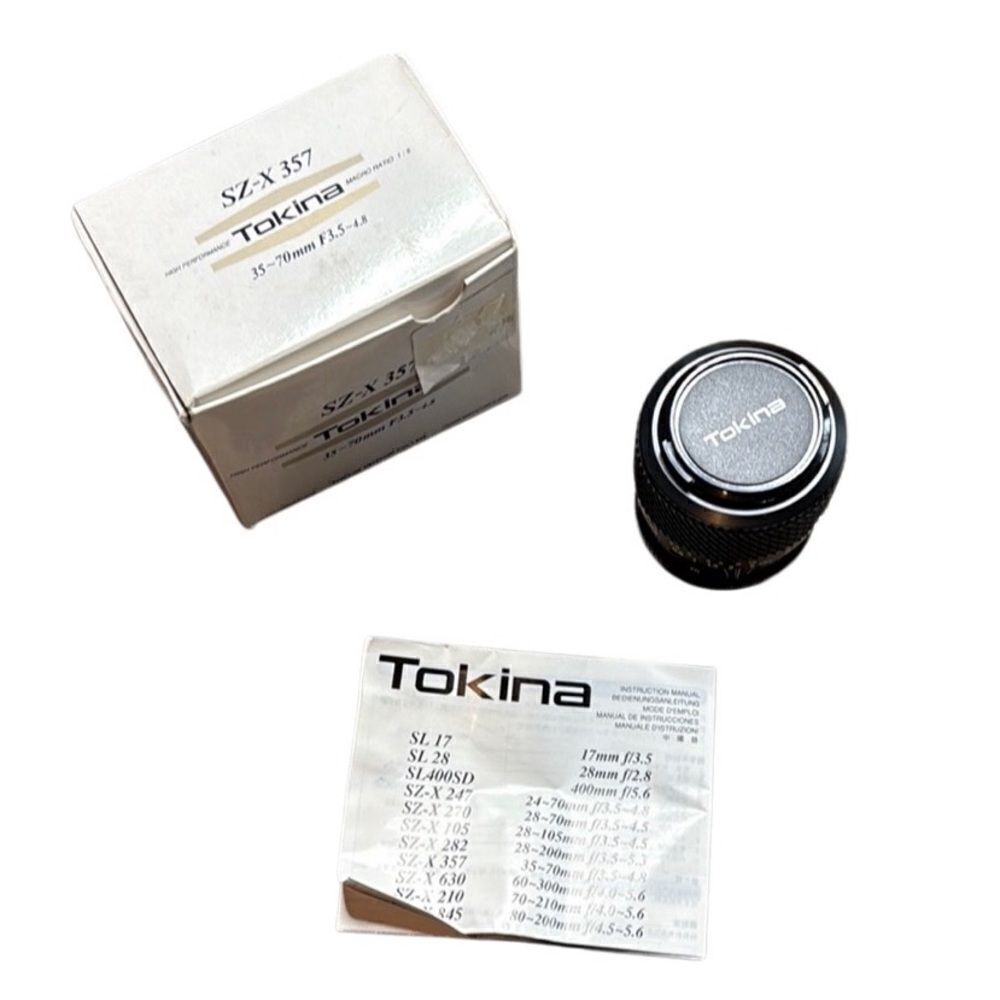 Tokina SZ-X 357 camera lens 49mm NIB